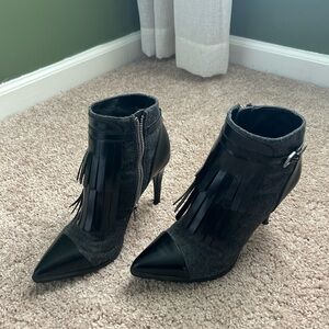 Women’s black and grey booties. Some scuffs on heels and need re-tipping. Size 8
